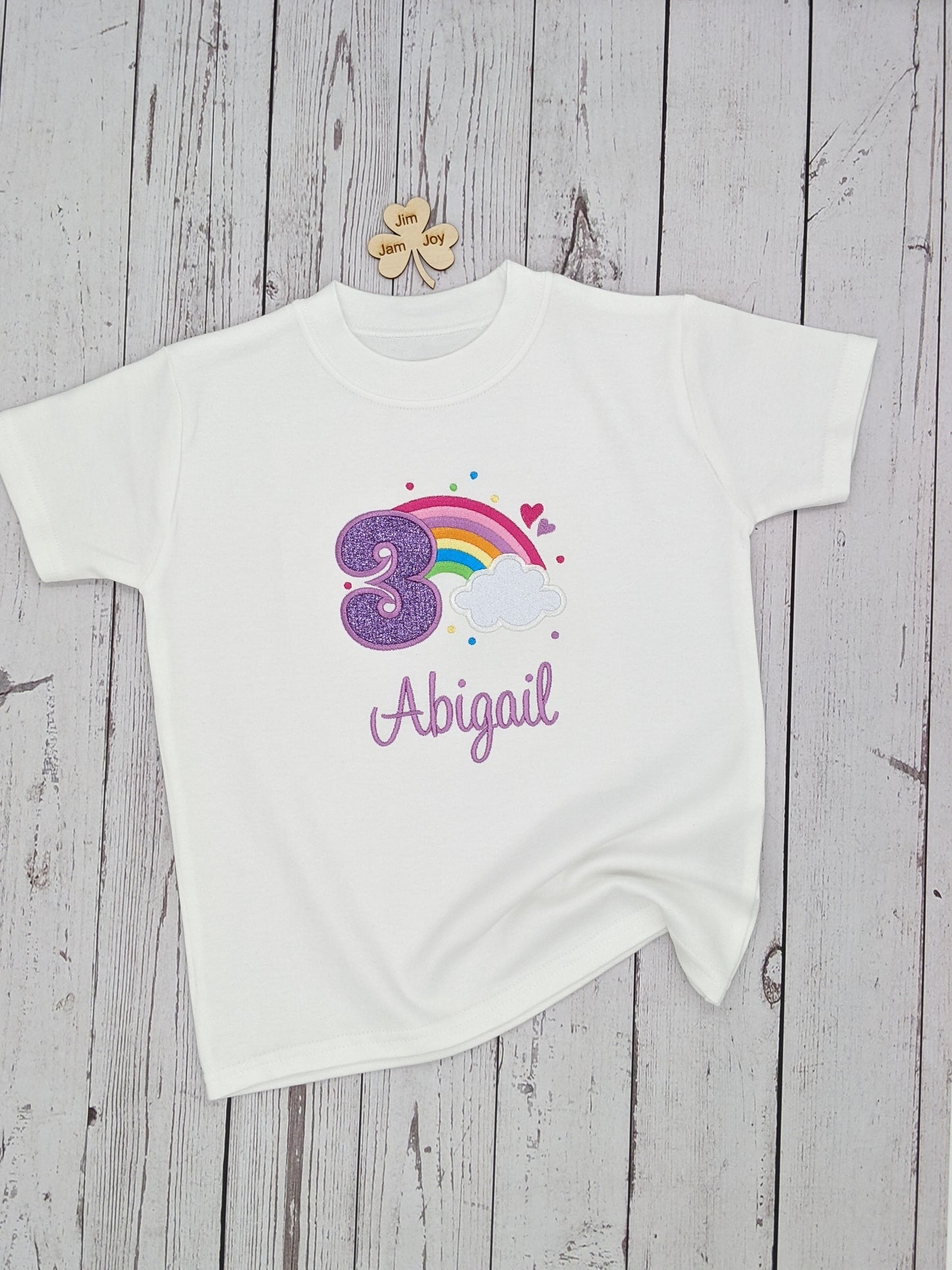 Children personalised birthday tshirt with rainbow and cloud