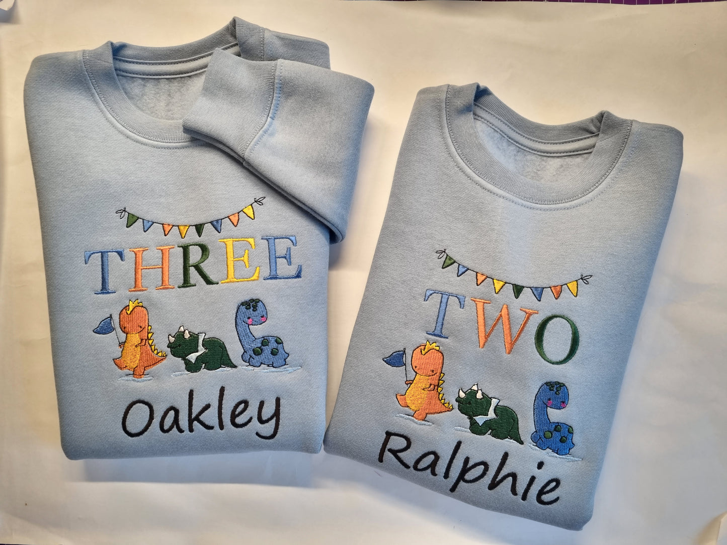 Children Personalised birthday Sweatshirt with trio of dinosaurs  Embroidery